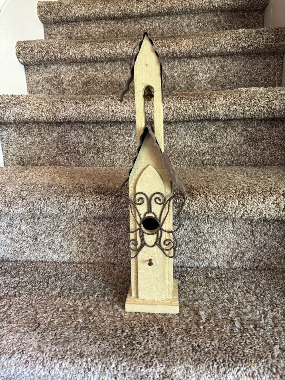 Decorative Yellow Wooden Birdhouse with Ornamental Metal Accent